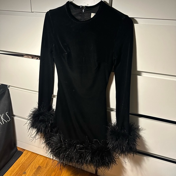 House of CB black velvet mini dress with feathers on cuffs and bottom - Picture 2 of 5
